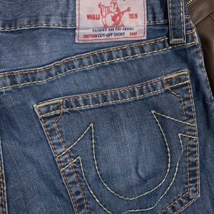 True religion cutoff jean shorts. Size 34, taper in at bottom